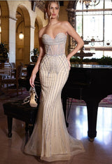Strapless full‑length crystal‑beaded gown with sheer illusion bodice and fit & flare skirt – The Starlet Gown from The Bakvri Showroom in Atlanta