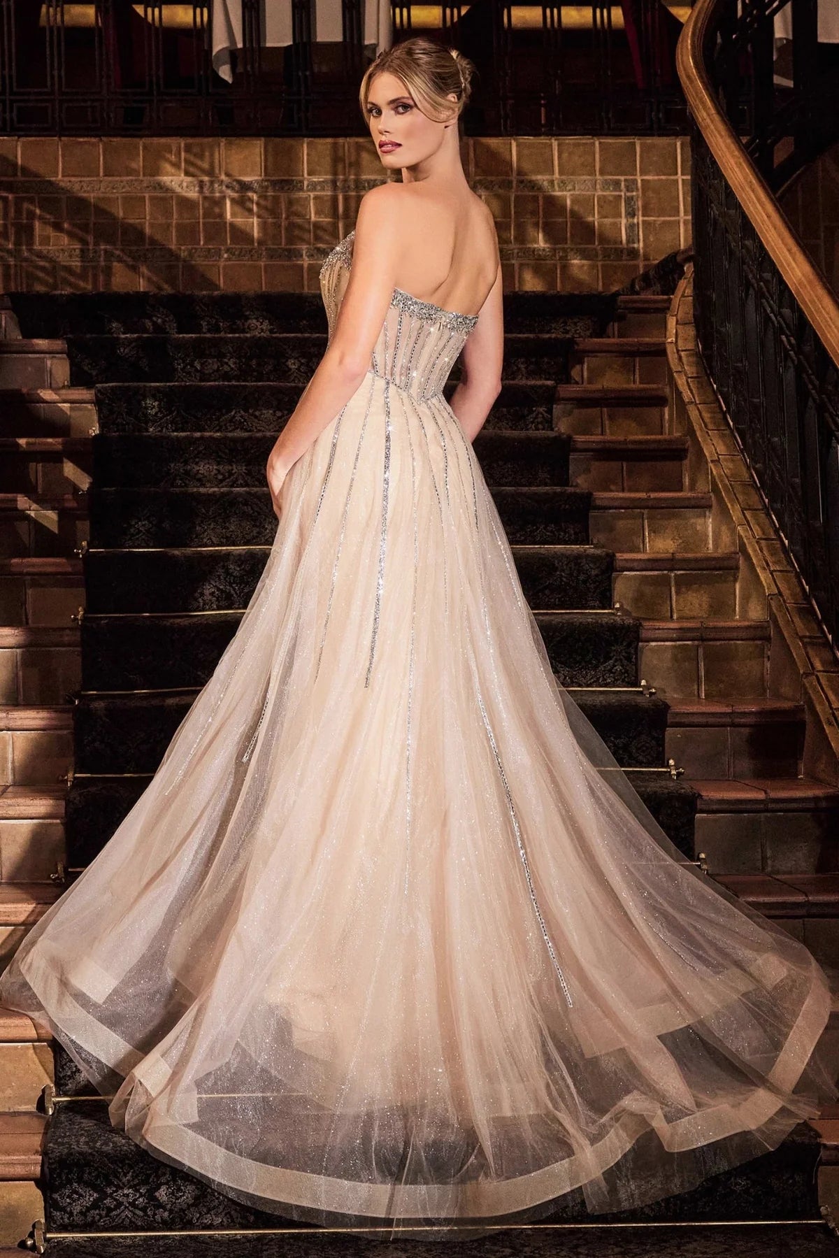 Strapless crystal embroidered gown with sweeping tulle train – The Boss Lady Gown, Atlanta showroom.”
“Close-up of boned bodice and crystal piping – Boss Lady Gown CB158.”
“Back view of layered tulle train in champagne tone – Boss Lady Gown.”